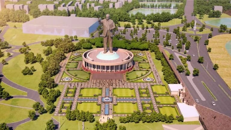 Aerial rendering of a landscaped memorial park with a central statue
