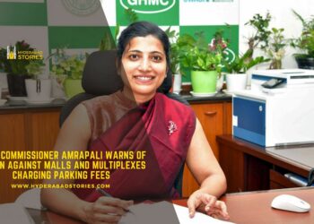 GHMC Commissioner Amrapali warns of action against malls and multiplexes charging parking fees.